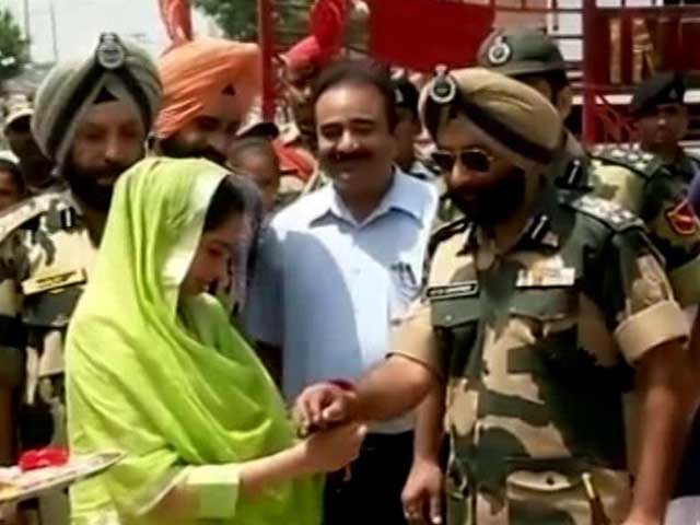 Union Minister Harsimrat Kaur Badal Ties Rakhis On BSF Troopers