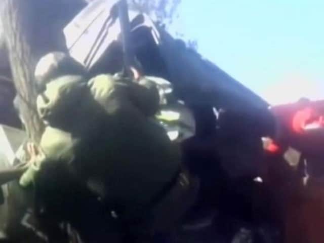 Video : Caught On Camera: Kashmiri Youth Rescue Soldier Trapped Inside Damaged Vehicle
