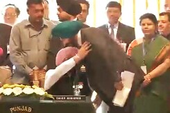 Oath Taken, Navjot Sidhu Touches Captain Amarinder Singh's feet Oath Taken, Navjot Sidhu Touches Captain Amarinder Singh's feet