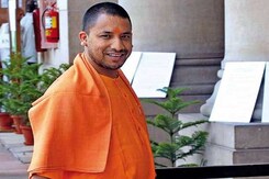 To Save Money, Yogi Adityanath Distributes Akhilesh Yadav Schoolbags To Save Money, Yogi Adityanath Distributes Akhilesh Yadav Schoolbags