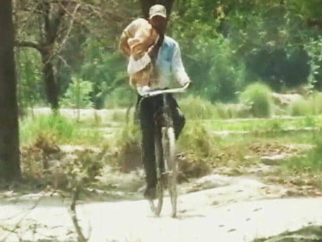 Video : No Ambulance, UP Man Carried Dead Baby On Cycle, Stretcher Used In Odisha