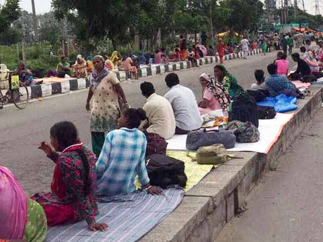 Despite No Entry Rules, A Town Fills With Followers Of 'Messenger Of God'