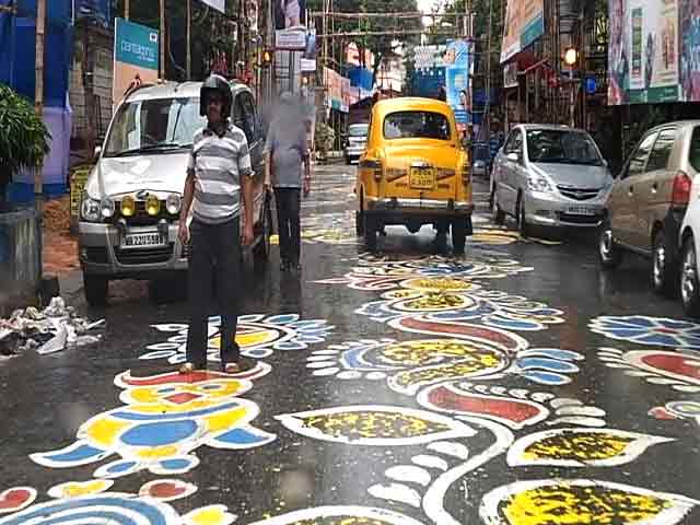 Rangoli Hues Brighten Kolkata Road Ahead Of Durga Puja