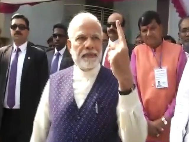 PM Modi Votes In Gujarat, Walks With Inked Finger For Huge Crowd