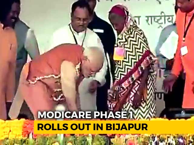 Video : PM Modi's Picture Perfect Moment With Slippers For Tribal Woman At Rally
