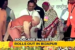 PM Modi's Picture Perfect Moment With Slippers For Tribal Woman At Rally PM Modi's Picture Perfect Moment With Slippers For Tribal Woman At Rally