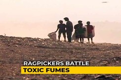 Rag Pickers And Their Families Breathing In Toxic Fumes Rag Pickers And Their Families Breathing In Toxic Fumes